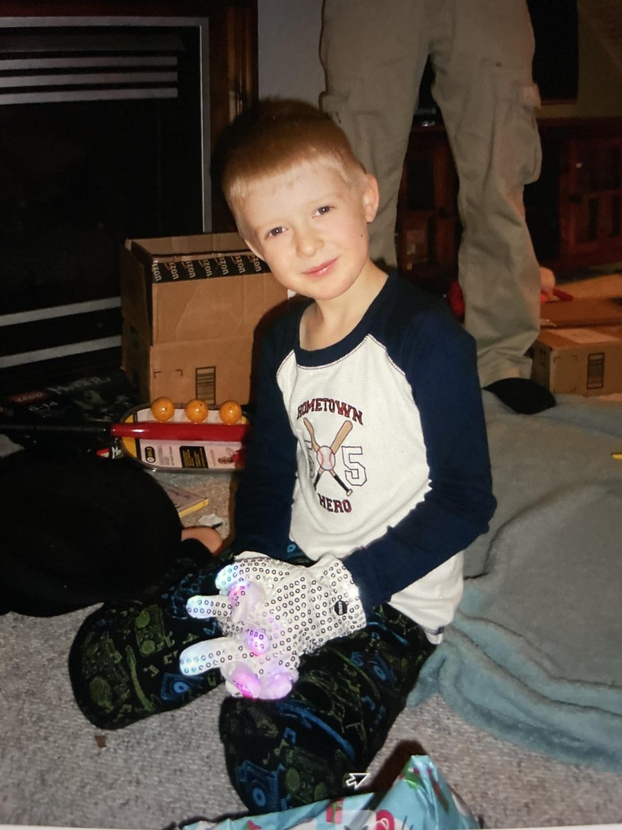 Jake opening up his Michael Jackson gloves on Christmas morning in 2012.