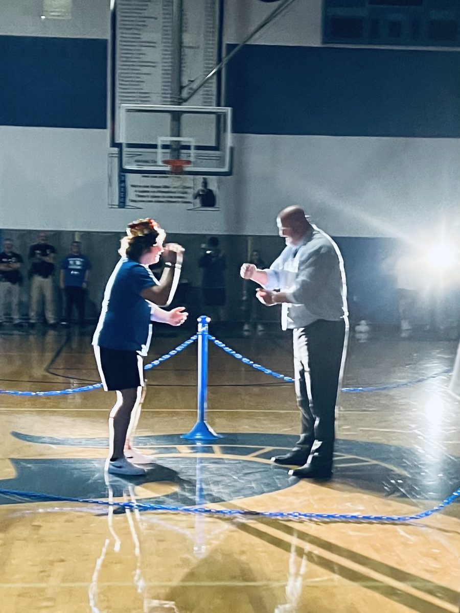 Joey Domonkos and Dr. Holtzman battle in Rock, Paper, Scissors. 