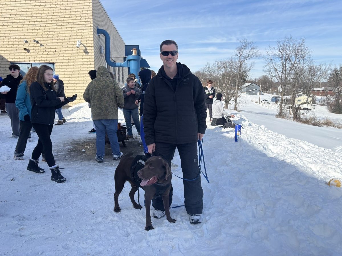 Mr. Hedddinger with his pup